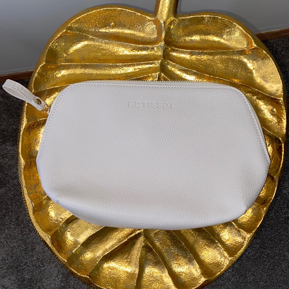 Tissot makeup bag. New. Off white
